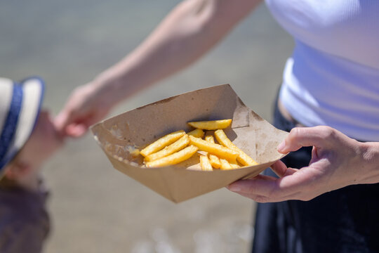 Sharing Crispy Fries During Summer