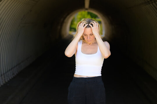 Stressed Woman Holding Her Head