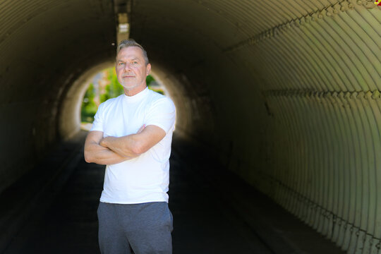 Serious Mature Man Crossing Arms