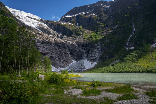 Brevatnet, a beautiful azure blue glacial lake of the B&oslash;yabreen Glacier, a tributary of the Jostedalsbreen Glacier in Norway.