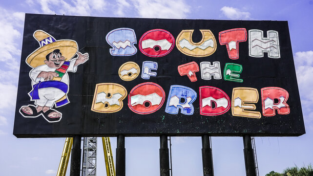 SOUTH CAROLINA, USA - JULY 17, 2026: South of the border roadside attraction billboard with Pedro mascot against blue sky