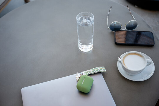 Serene work-life balance in coastal cafe setting