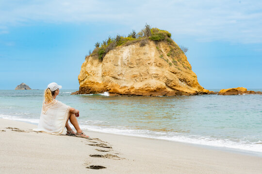 Traveler relaxes on Los Frailes Beach in Ecuador