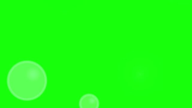 White soap bubbles floating upwards against a vibrant green background