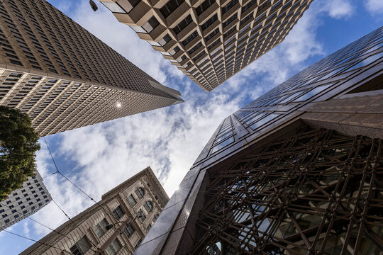 Looking up at San Francisco skyscrapers and cloudy sky