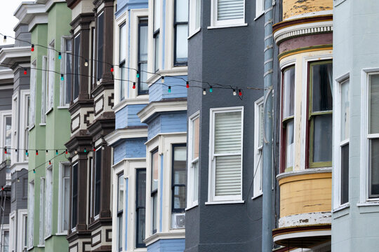Colorful Victorian facades with string lights in San Francisco
