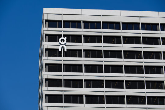 On Running company logo on modern corporate headquarters building in Zurich