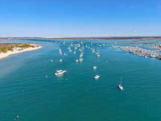 aerial view of the Cano de Sancti Petri with many boats and the Puerto Deportivo de Sancti Petri marina between Cadiz, San Fernando and Chiclana de la Frontera, Andalusia, Spain © keBu.Medien