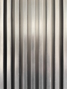 Vertical corrugated metal texture with silver industrial lines