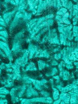 Turquoise underwater stone texture with natural abstract pattern