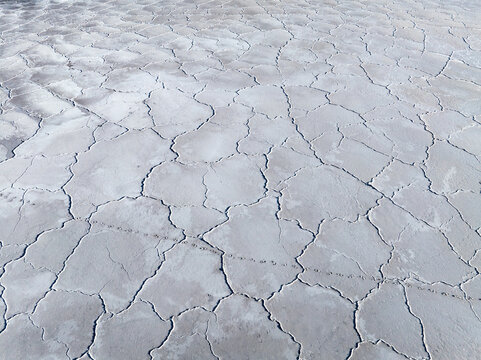 Cracked salt flat texture at Laguna Espejo, Argentina