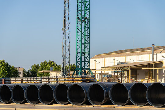 Precast concrete pipes in industrial factory yard