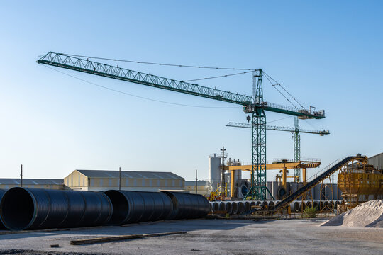 Industrial crane at precast concrete factory site