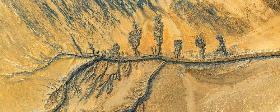 Aerial view of abstract mineral patterns in vibrant hues