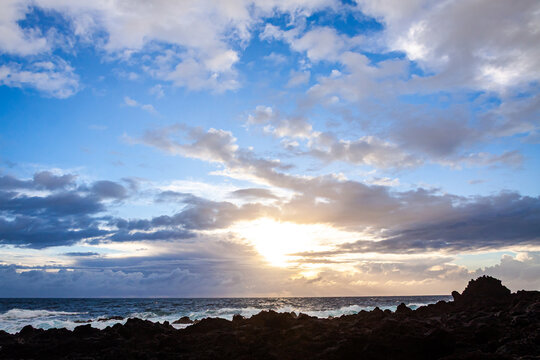 Dramatic coastal landscape at Ponta da Ferraria on Sao Miguel Island, Azores, Portugal, featuring volcanic shoreline, Atlantic Ocean and evening clouds
