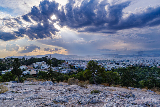Athens cityscape with storm clouds