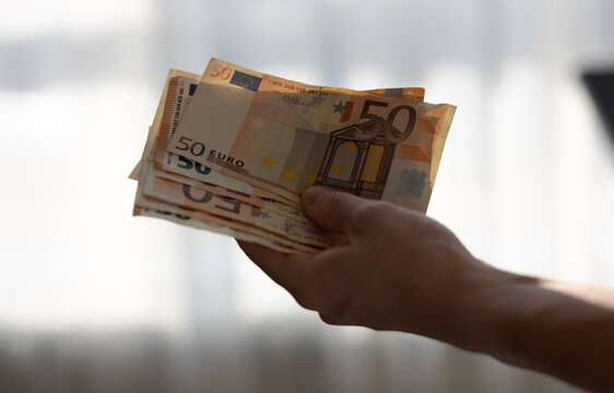 euro banknotes in hand
