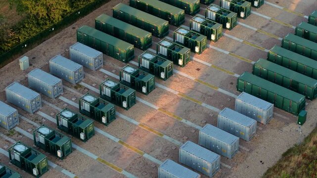 Close up aerial view of green battery energy storage systems BESS for UK grid resilience