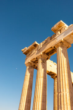 Ancient Greek temple under clear blue sky