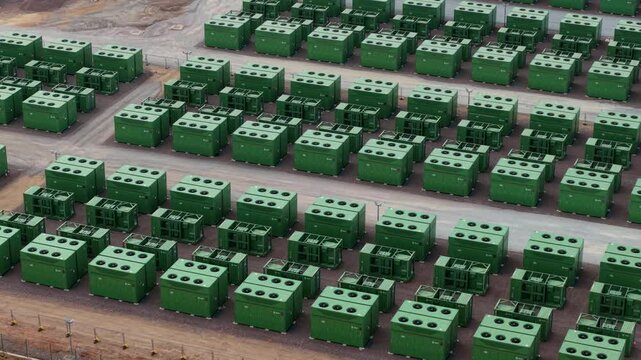 Close up aerial view of containerised lithium iron phosphate BESS battery storage units