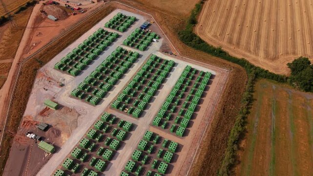 Aerial view of containerised battery energy storage systems BESS with liquid cooled lithium iron phosphate cells