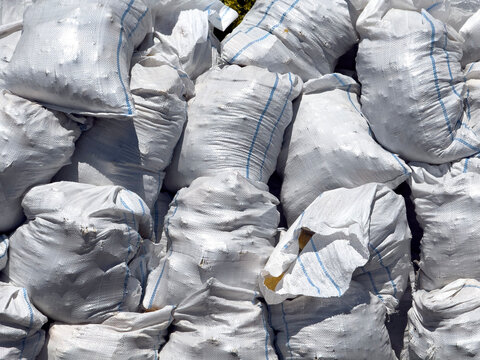 White construction material sacks at a construction site