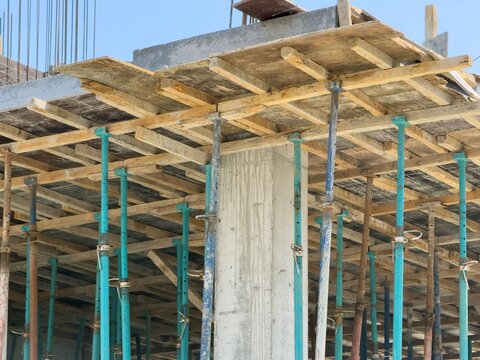 Concrete column and timber formwork at construction site