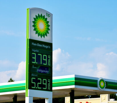 Sign with gas prices posted at a BP gas station, North Carolina, USA