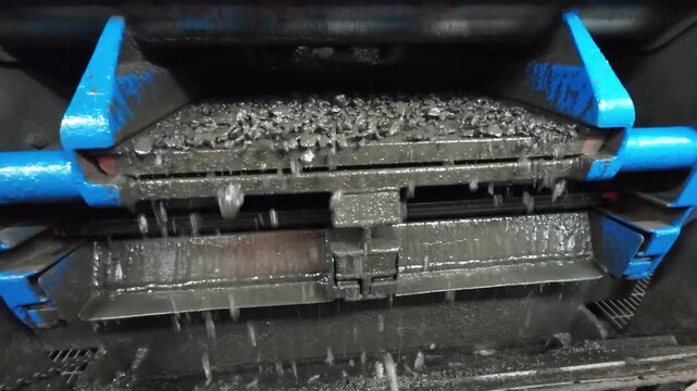 A shale shaker on an oil rig is a vibrating screen that separates large drilled solids, or cuttings, from the drilling fluid, or mud.