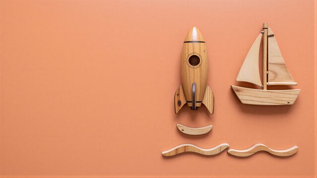 Wooden rocket and sailboat on warm orange background, symbolizing adventure and exploration.