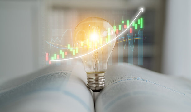 A light bulb symbolizes innovation and ideas resting on an open book, with graphs illustrating financial growth, representing knowledge in business and education. Impute
