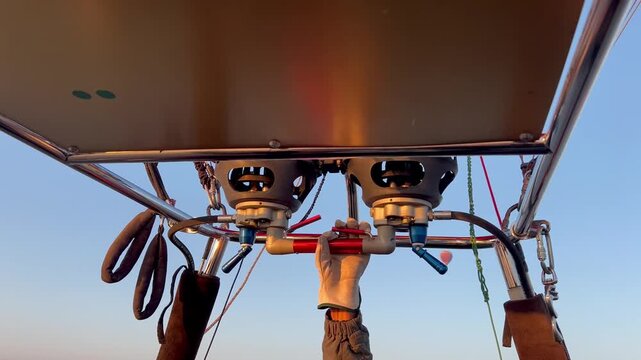setting fire flame inside the hot air balloon, Laos, Vang Vieng