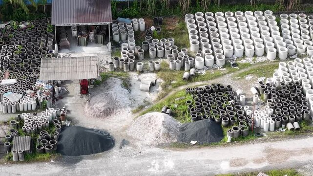 Activities of workers making culverts and bridge blocks