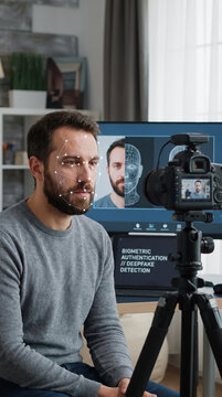 Man recording video for biometric authentication and deepfake check