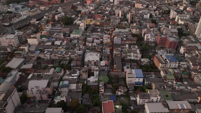 sunset time bangkok city residential urban exterior traffic street road aerial panorama 4k thailand 