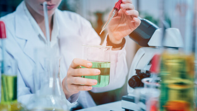 Scientist or researchers working in science laboratory, medical technology research work, science laboratory research and development concept.