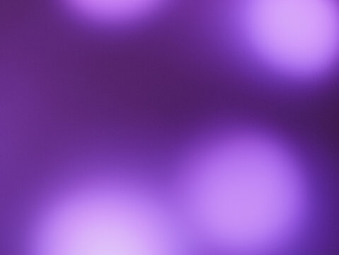 Una toma de cerca de una fondo abstracto de color morado o violeta  de luces de navidad en la oscuridad. Desenfoque bokeh