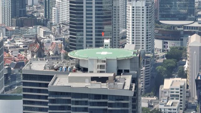 sunny day bangkok city center helicopter rooftop spot traffic road aerial panorama 4k thailand
