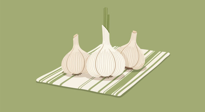 Garlic bulbs on a striped kitchen towel