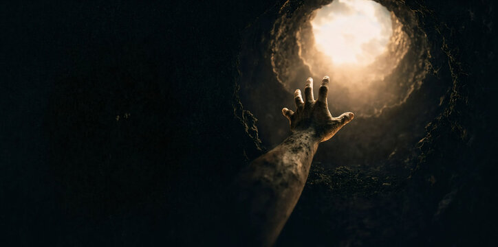 Dirty Hand Reaching Towards Bright Light from a Dark Deep Pit Symbolizing Hope Rescue and Struggle