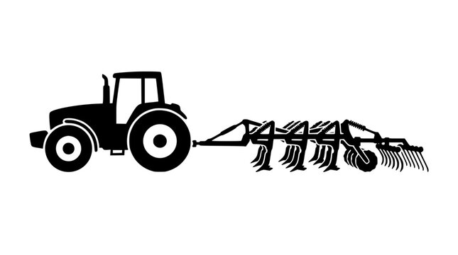 Black silhouette of a farm tractor pulling an agricultural plow