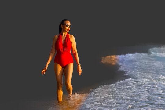 Woman pretty with red swimsuit on beach