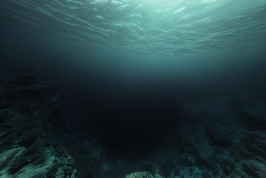 Generated fictional underwater scene with seabed and a large abyss pit.