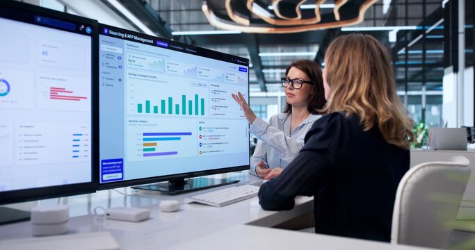 Woman Analyzing Supplier Proposals On Computer