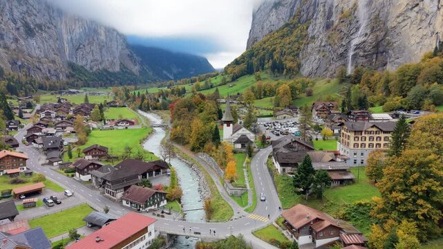 Aerial view of Lauterbrunnen alpine village and Staubbach Falls in autumn. Canton of Bern, Switzerland.