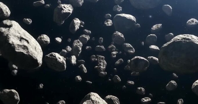 Stunning animation of numerous asteroids flying through dark deep space cosmos background.