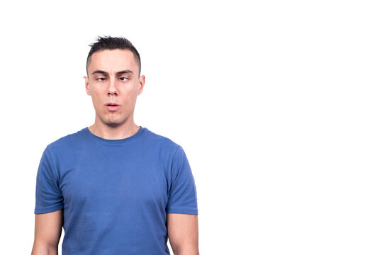 Squint-eyed adult man grimacing with tired expression