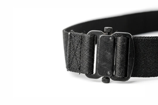 Tactical belt with metal buckle on white background