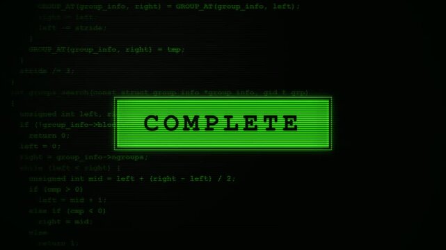 A bright green rectangular notification box displaying the word complete sits prominently over layers of complex programming code written in a typewriter font on a dark digital display screen
