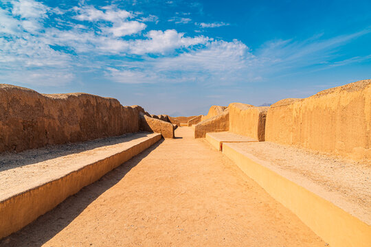 Ancient adobe corridor at Chan Chan archaeological site in Peru